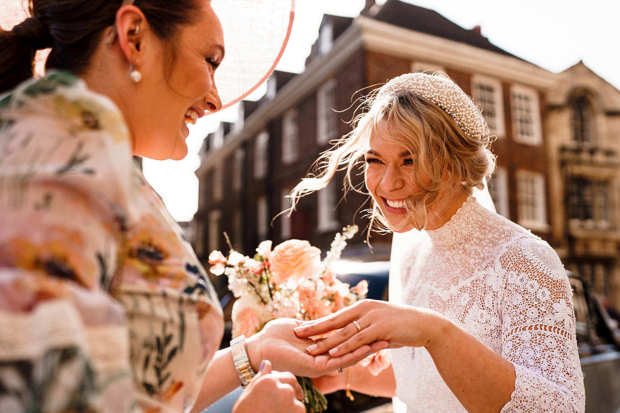 bride shows off her ring after getting married in The Cotswolds