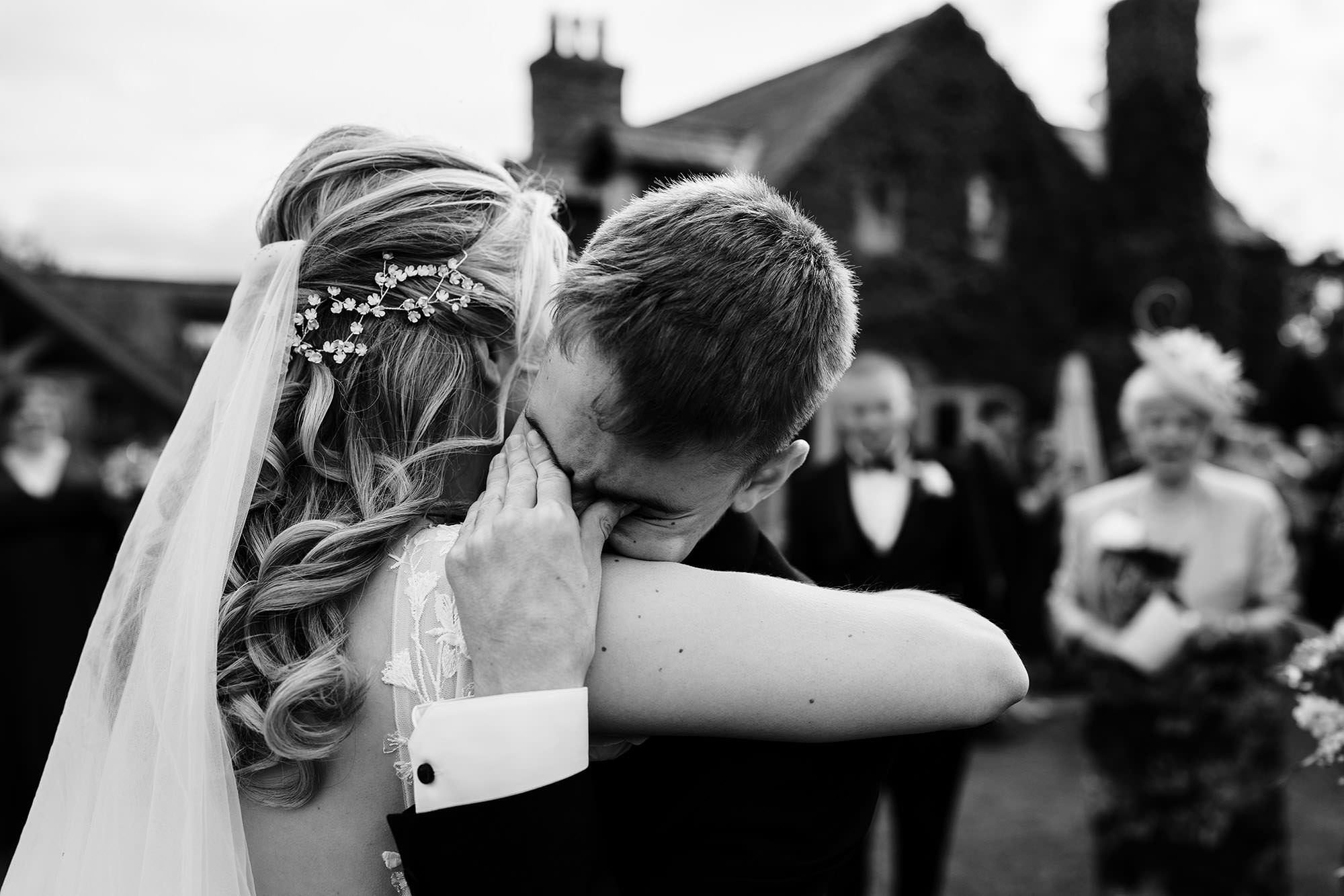 wedding guest looking emotional with bride